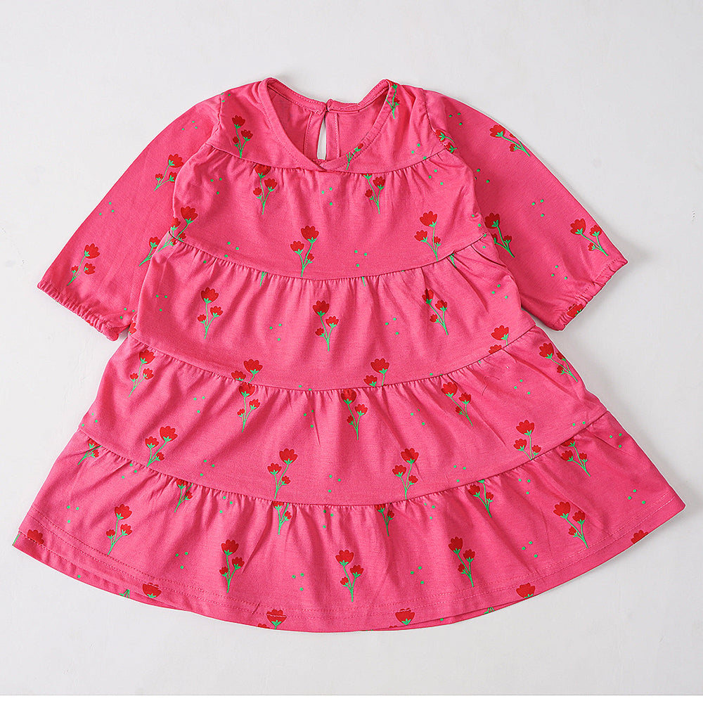 Blooming Beauty: Pink Tiered Dress with Floral Print and Long Sleeves