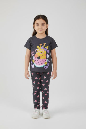 Giraffe Slumber: Black Pajama Set with Whimsical Design